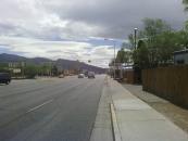 The road points directly toward the past that I go up and over.