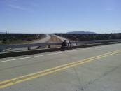 The frontage occasionally switched between the north and south side of the freeway.