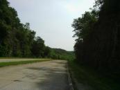 Riding between some cliffs at the beginning of the day
