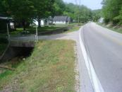 All the driveways oh the section of highway T had a little bridge.